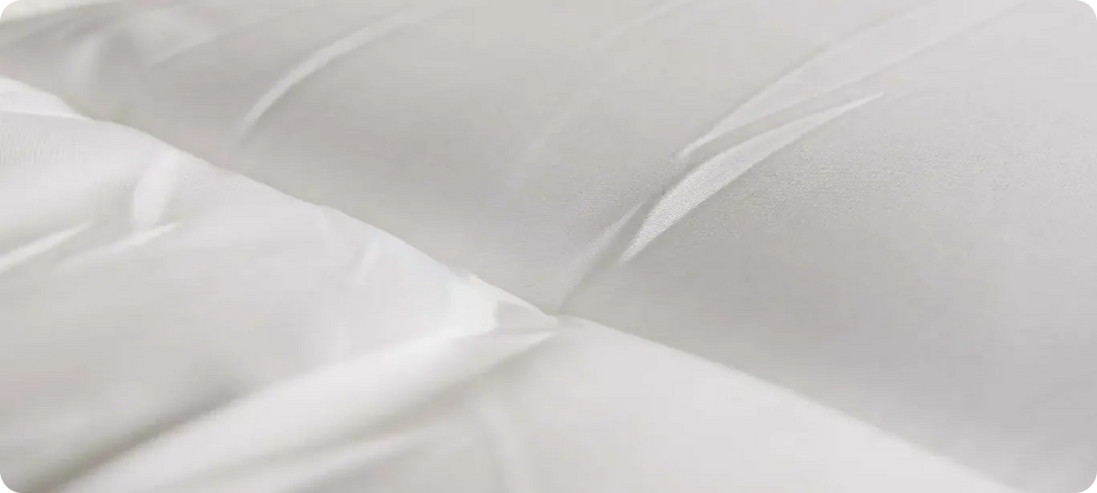 Close-up of the quilted CloudTopper surface