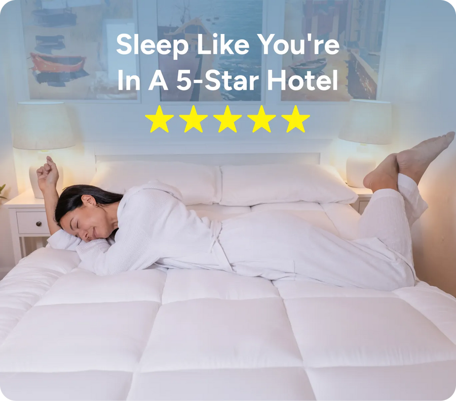 Woman asleep on a plush hotel-style bed