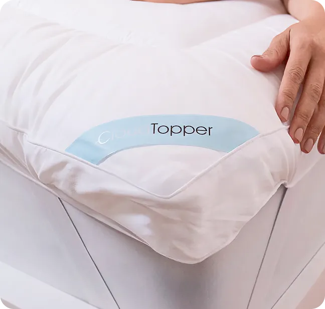 CloudTopper fitted to a mattress corner